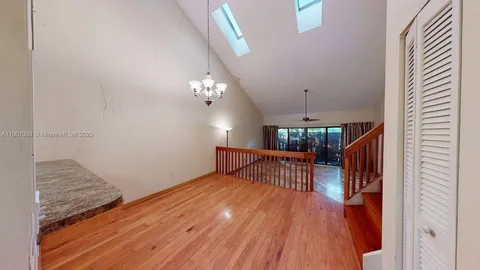 a bathroom with a sink a mirror and a toilet