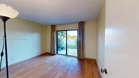 a bathroom with a double vanity sink and mirror