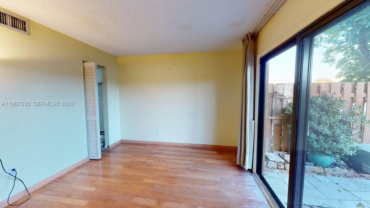 4222 Southwest 87th Terrace Davie, FL 33328 - Photo 41 of 85 Bright and spacious bedrooms featuring large windows, natural light, and serene views that create a calm, inviting retreat.