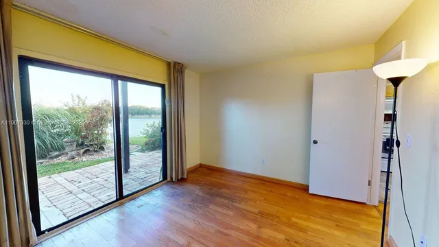 a kitchen with stainless steel appliances a stove and a refrigerator