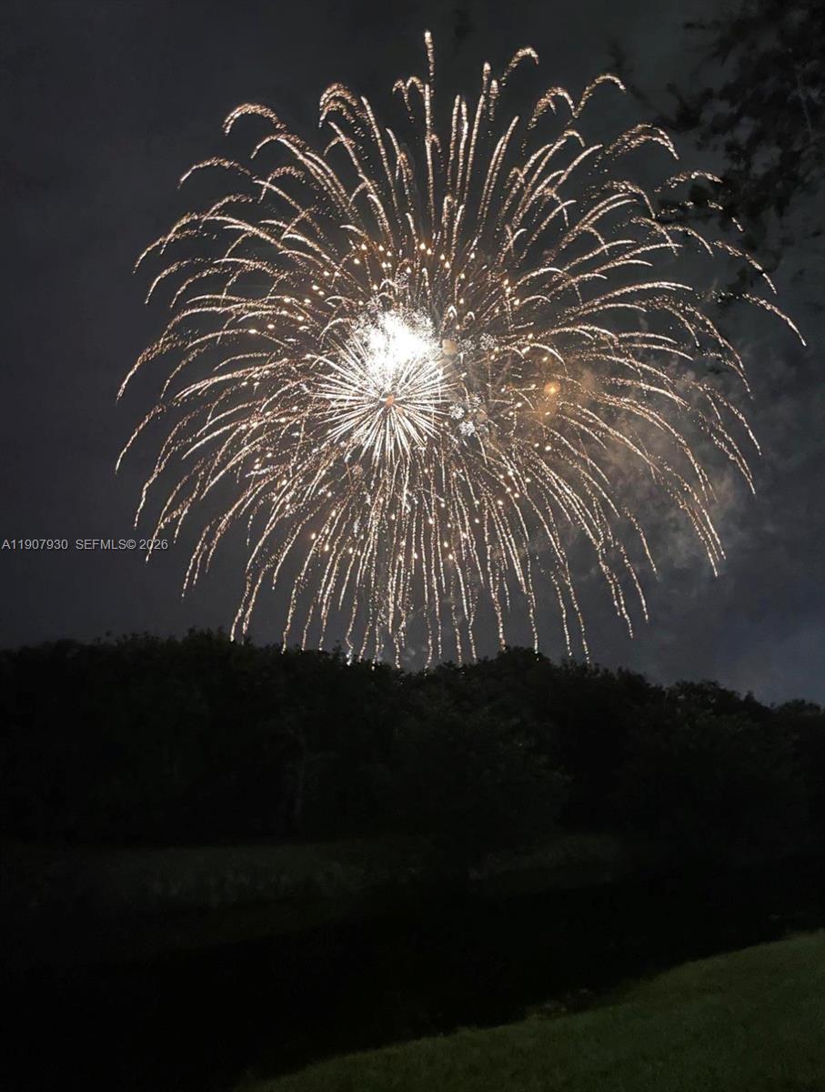 4222 Southwest 87th Terrace Davie, FL 33328 - Photo 77 of 85 Breathtaking sunset views over the canal the community’s main gathering spot for the annual Fourth of July fireworks, right from your own backyard.