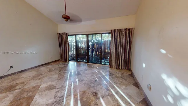 a view of a porch with wooden floor and outdoor space