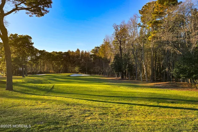 a view of a playground with basketball court