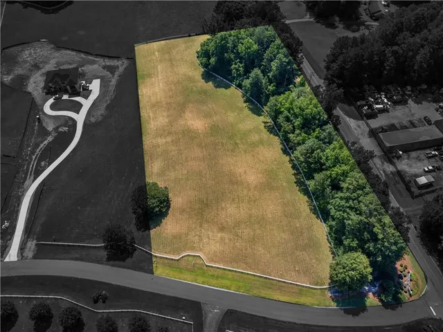 an aerial view of a residential houses