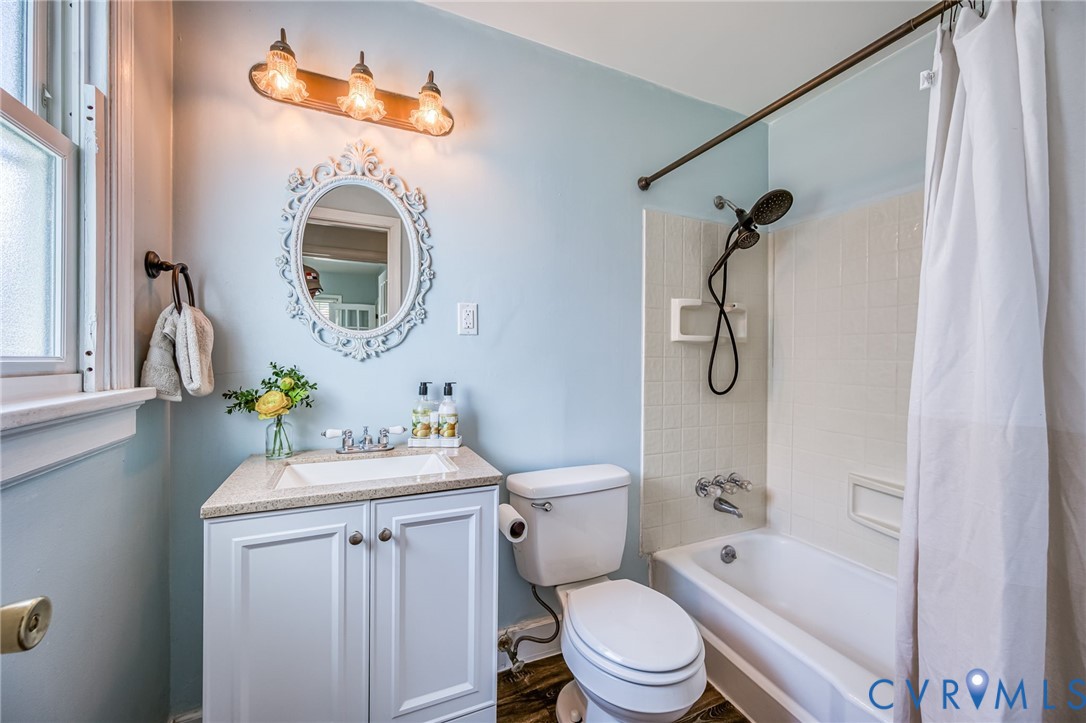 2129 Ginter Street Richmond, VA 23228 - Photo 20 of 38 a bathroom with a sink a toilet and shower