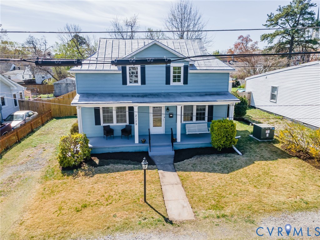 2129 Ginter Street Richmond, VA 23228 - Photo 33 of 38 a front view of a house with a yard