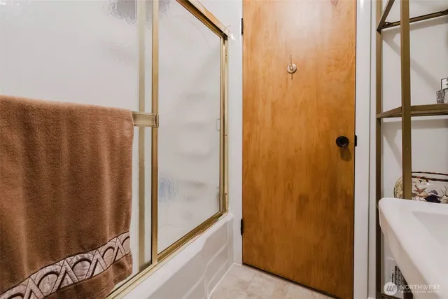 a room with furniture and a flat screen tv