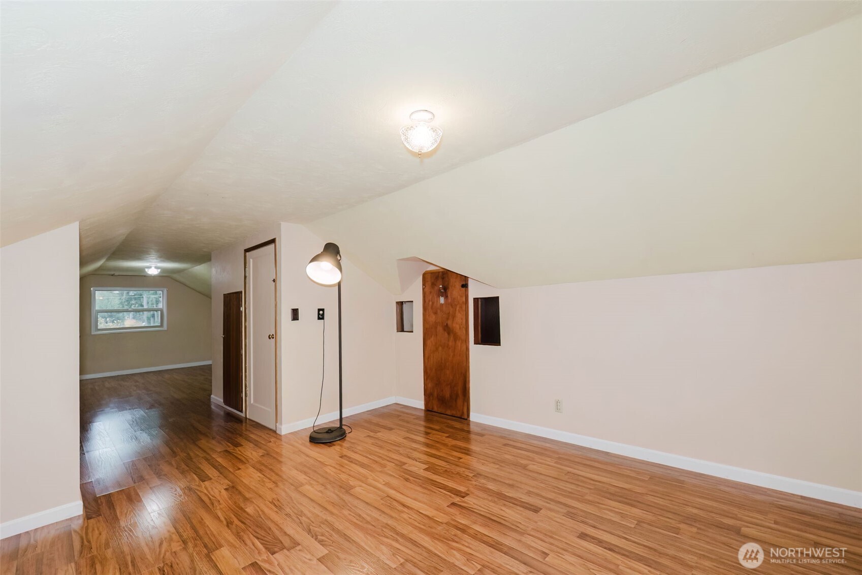3126 Rocky Point Road Northwest Bremerton, WA 98312 - Photo 28 of 40 a view of a livingroom with wooden floor