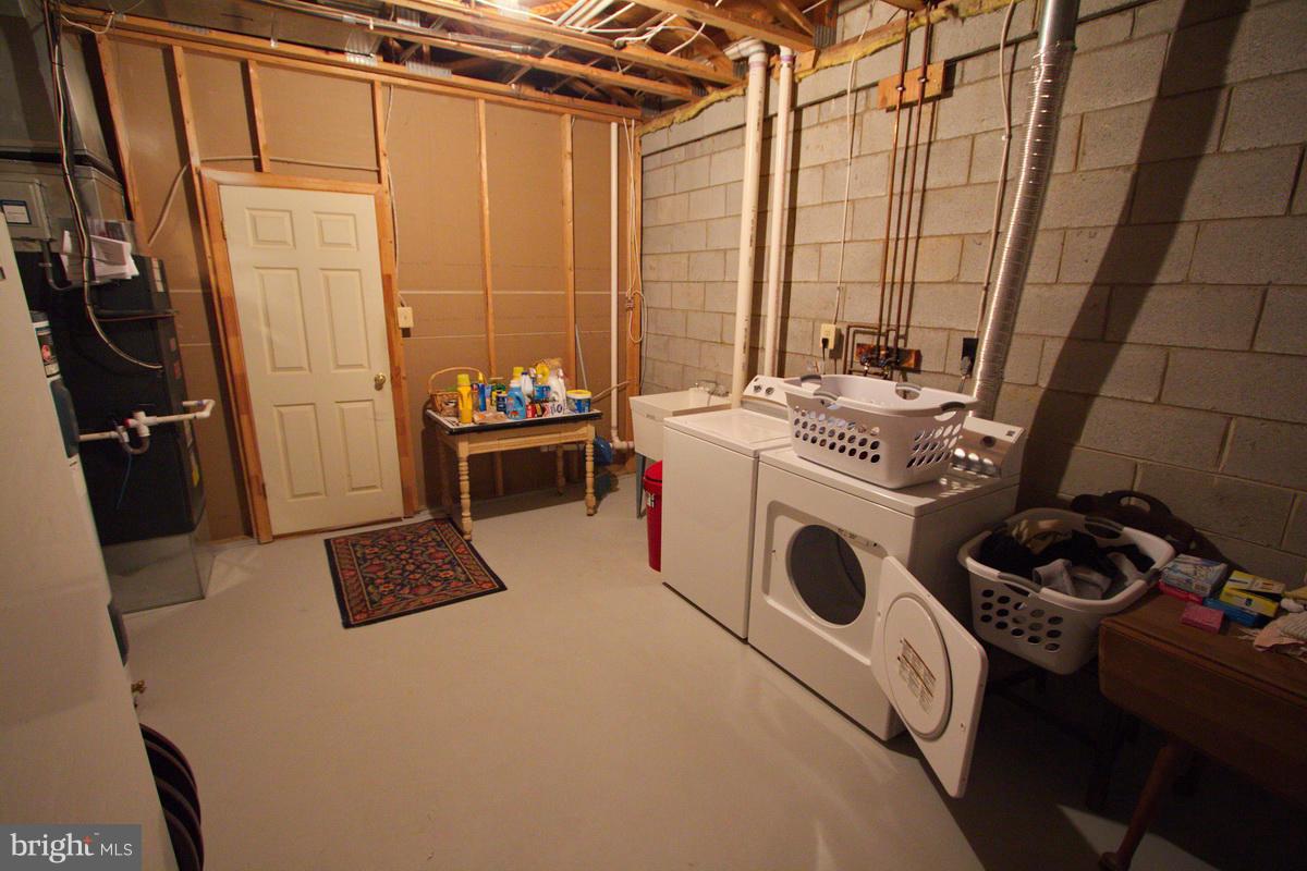 5237 Columbia Road, Unit 569 Columbia, MD 21044 - Photo 24 of 30 Basement - laundry - storage