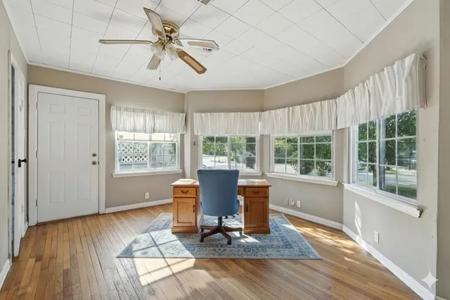 a view of a livingroom with furniture window and outside view