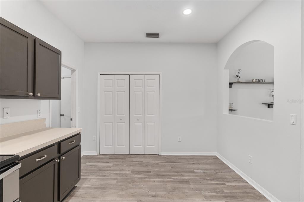 224 Oak Lane Ocala, FL 34472 - Photo 15 of 33 a view of a kitchen with cabinets
