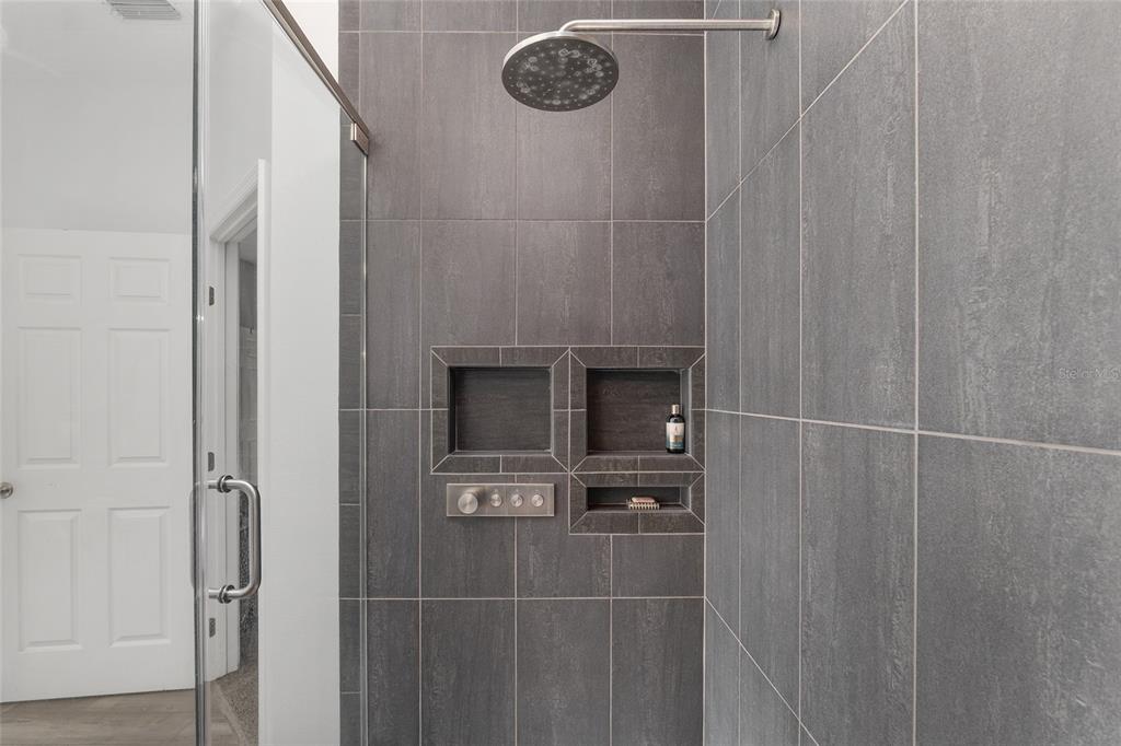 224 Oak Lane Ocala, FL 34472 - Photo 22 of 33 a bathroom with a shower and a sink