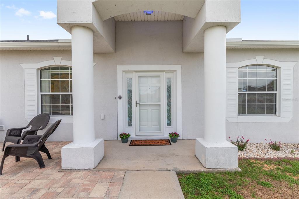 224 Oak Lane Ocala, FL 34472 - Photo 3 of 33 a building outdoor space with patio furniture