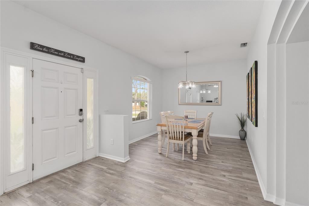 224 Oak Lane Ocala, FL 34472 - Photo 5 of 33 a dining room with furniture and window