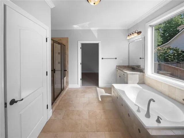 a bathroom with a sink and a tub