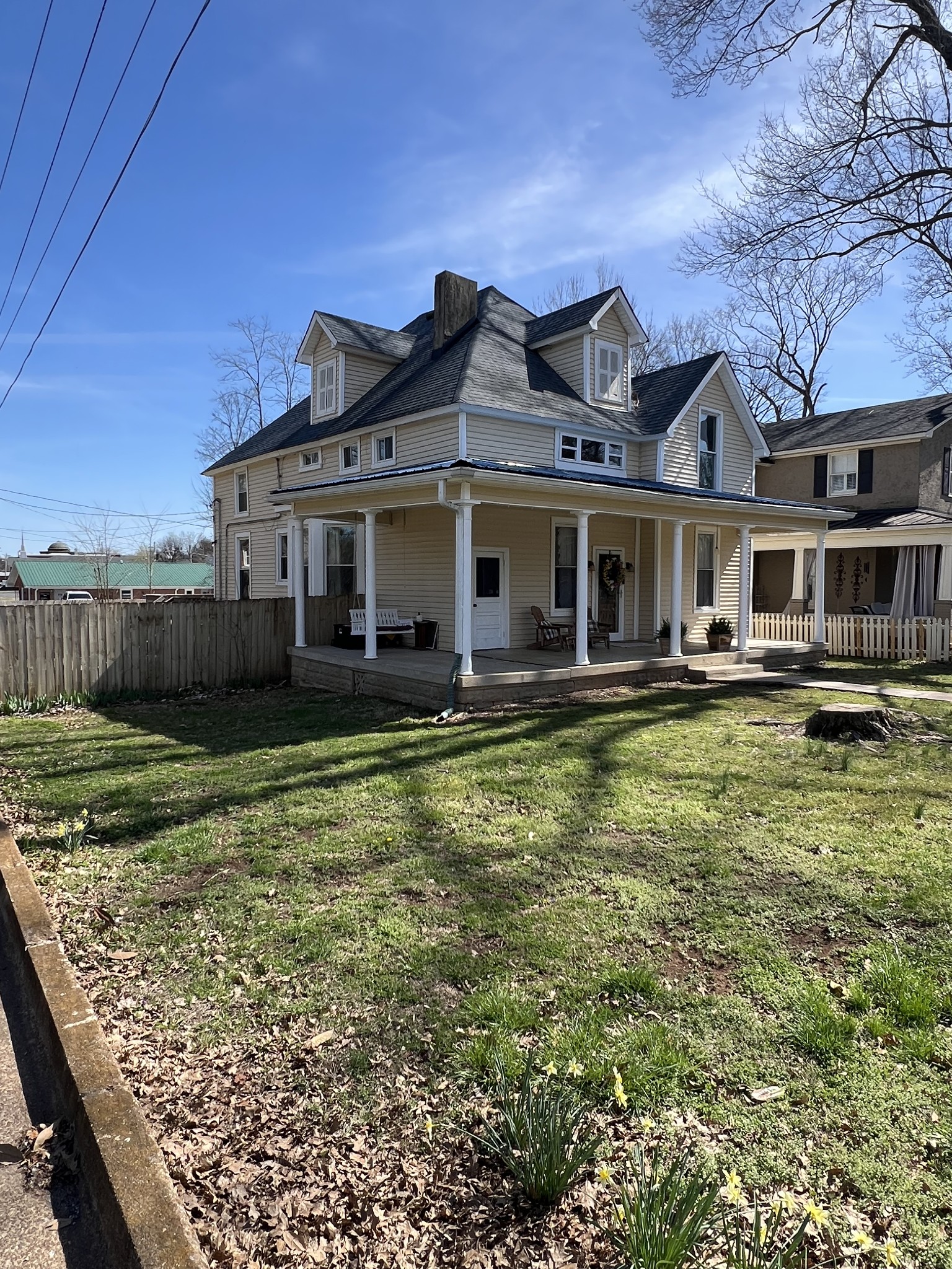 201 Pleasant Street Mount Pleasant, TN 38474 - Photo 2 of 38 a front view of a house with a yard table and chairs