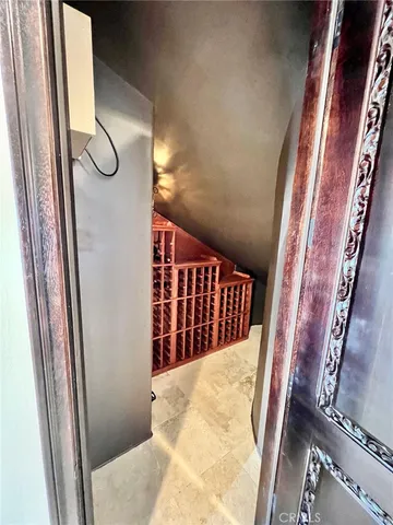 a view of a kitchen with a refrigerator