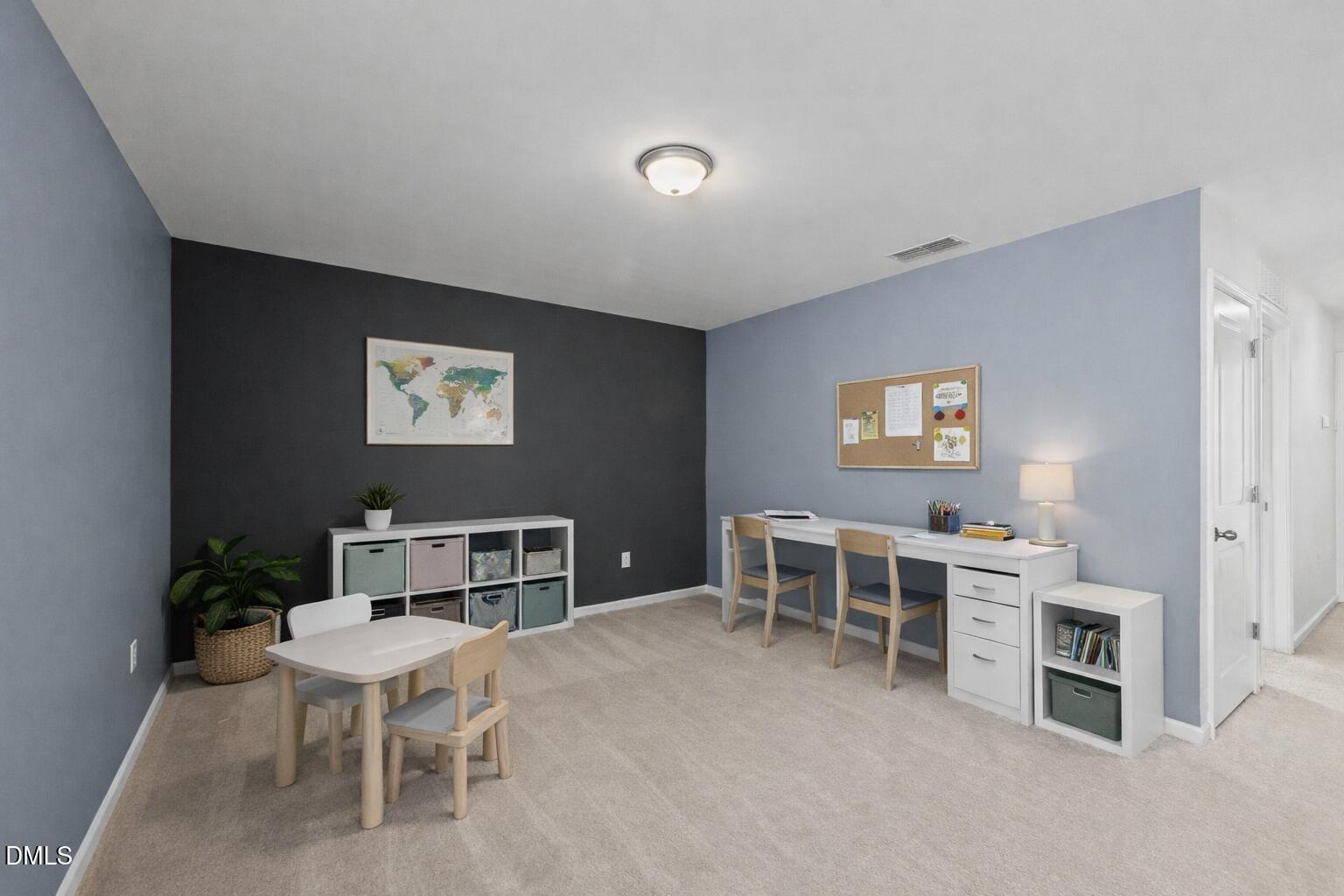 1421 Justice Union Court Raleigh, NC 27604 - Photo 13 of 21 a view of a workspace with furniture