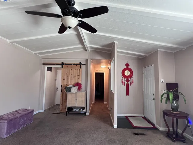 a view of a hallway with workspace