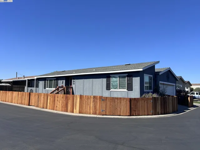 a view of a house with swimming pool