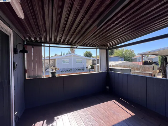 a view of kitchen with wooden floor