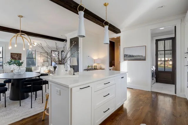 a kitchen with counter top space and cabinets