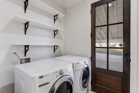 a utility room with dryer and washer