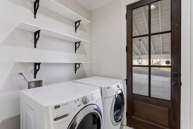 a utility room with dryer and washer