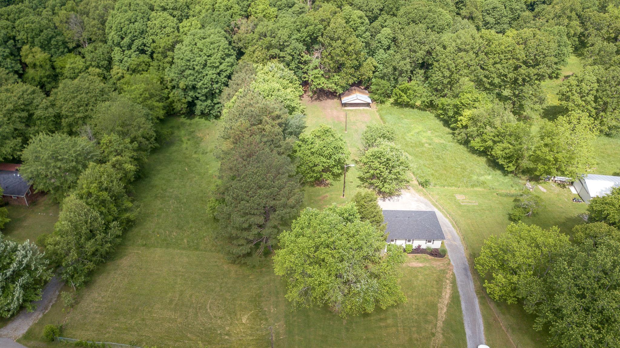7373 Harper Road Joelton, TN 37080 - Photo 3 of 30 These aerial views show the property, and it's bucolic setting~beautiful deep level acreage and the privacy of mature trees~