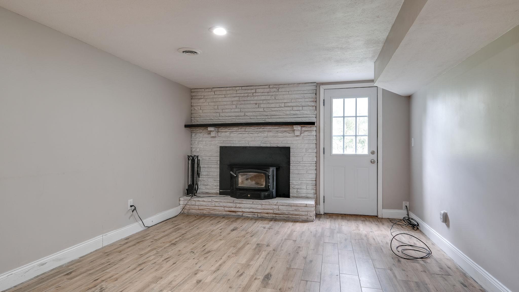 7373 Harper Road Joelton, TN 37080 - Photo 23 of 30 Unlimited possibilities for this rec room, kids playroom, man cave, family gathering area and media room~
