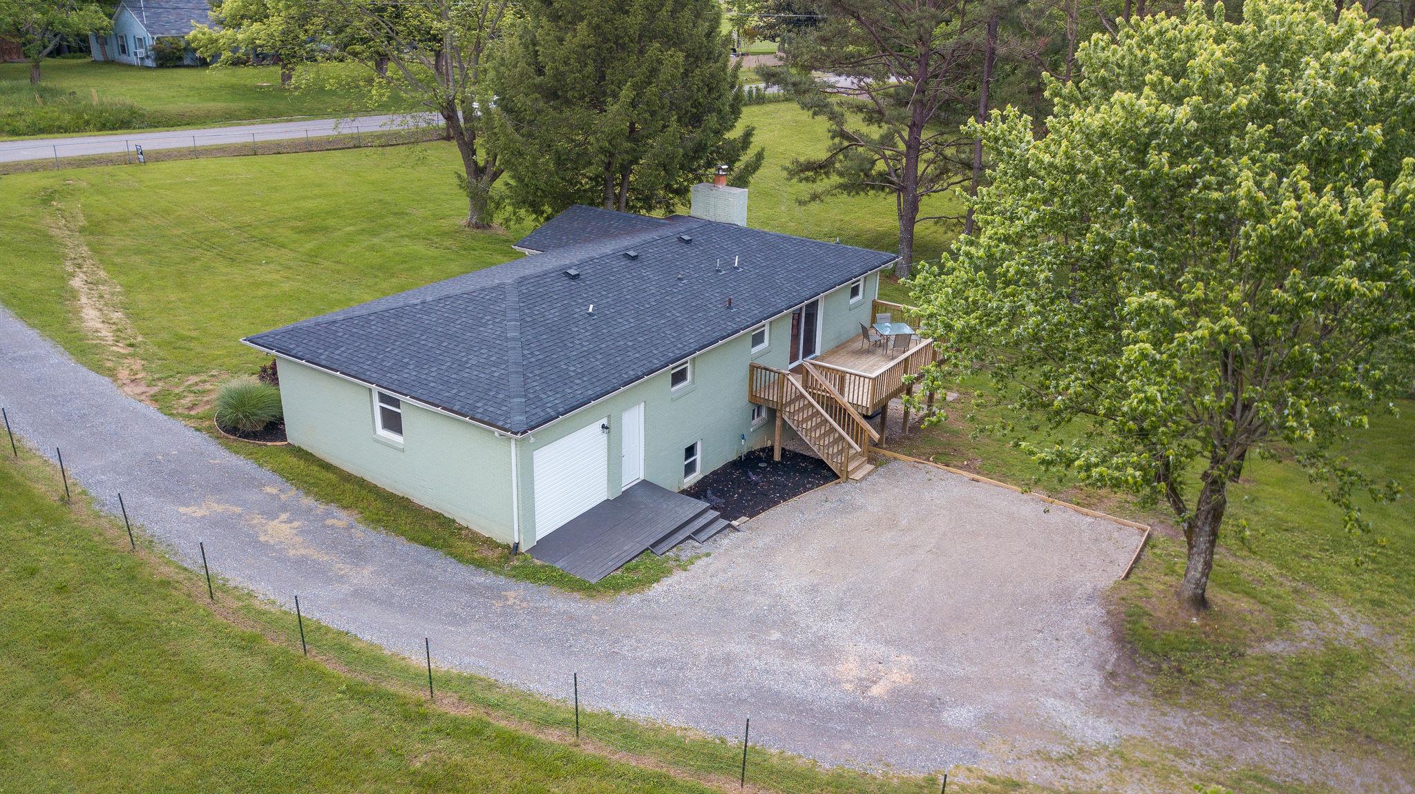 7373 Harper Road Joelton, TN 37080 - Photo 5 of 30 The home was renovated in 2017 and the sellers added many additional updates such as a driveway in the rear, new gutter system, brand new water line~See the features sheet for more info on upgrades~