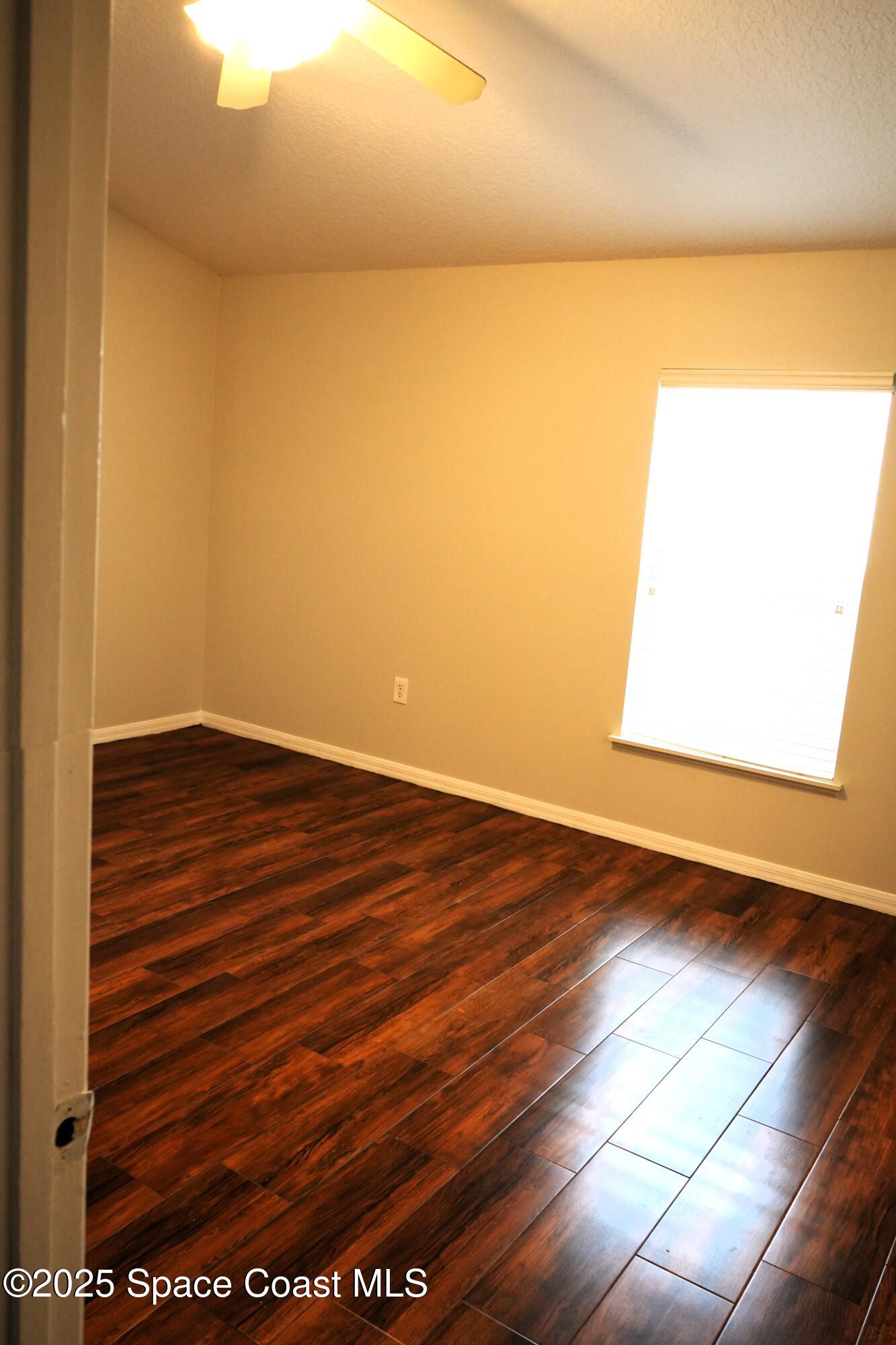 2125 Canopy Drive Melbourne, FL 32935 - Photo 10 of 18 a view of an empty room and window