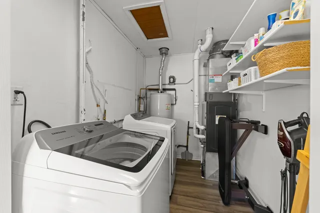 a utility room with dryer and washer