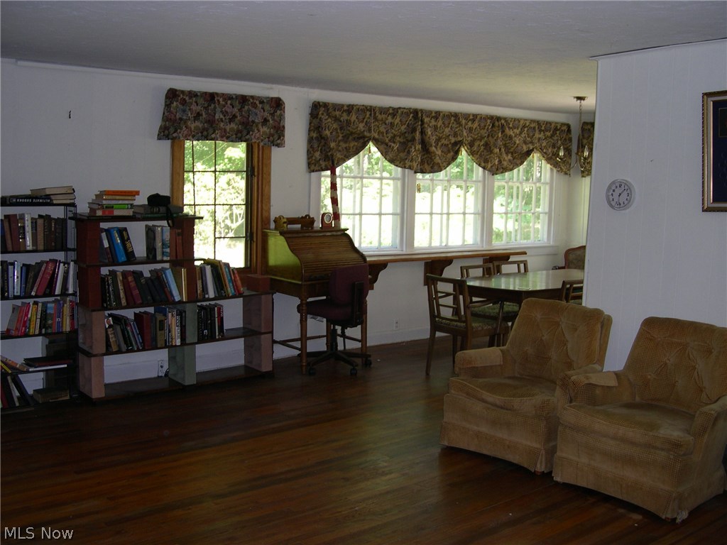 A view of the transition from the living room to the dining room.