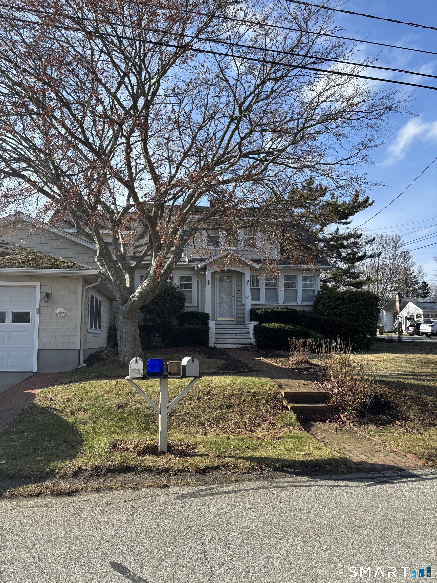 41 Sunrise Avenue Niantic, CT 06357 - Photo 1 of 15 a front view of a house with a yard