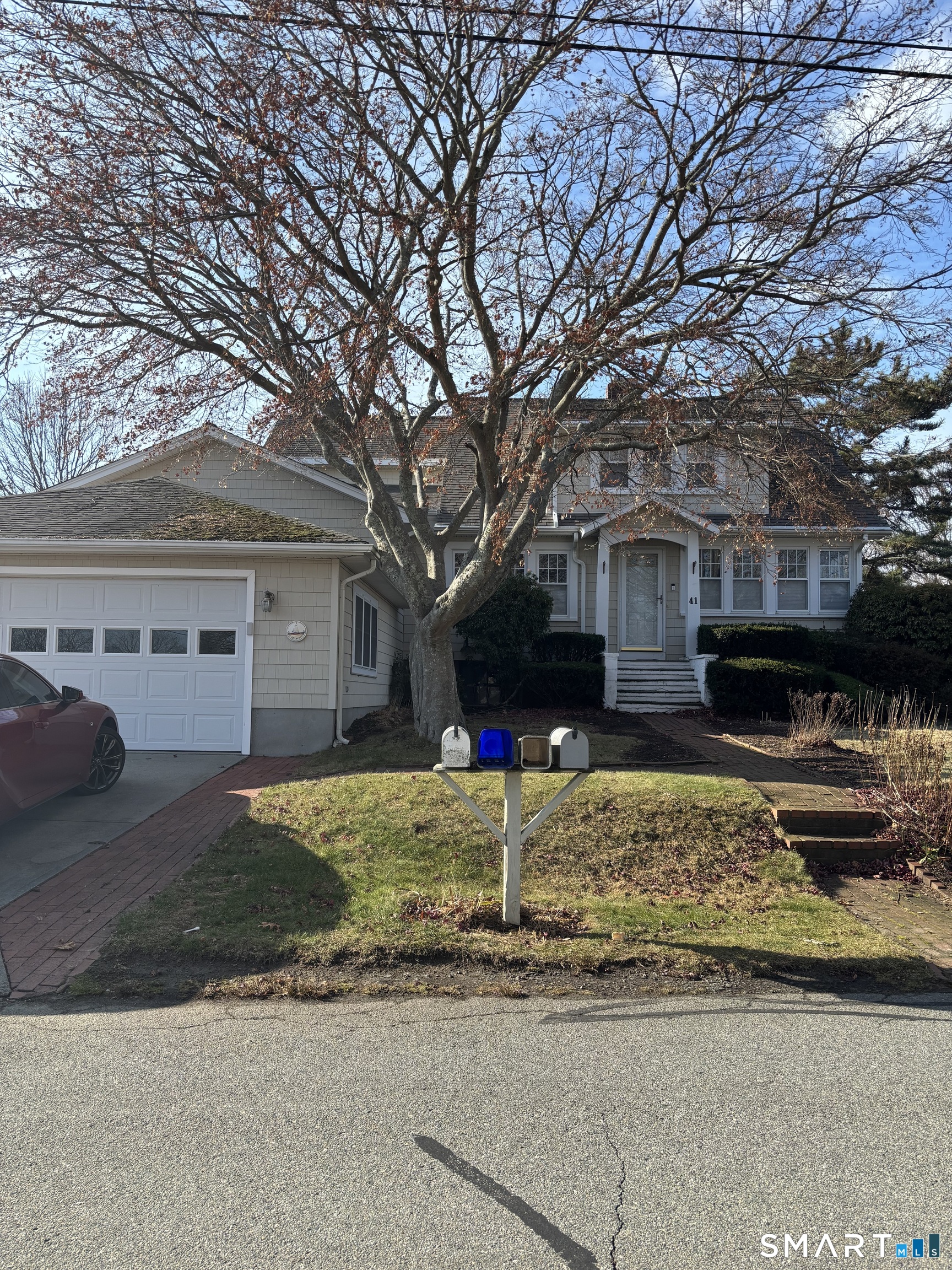 41 Sunrise Avenue Niantic, CT 06357 - Photo 2 of 15 a house view with a outdoor space