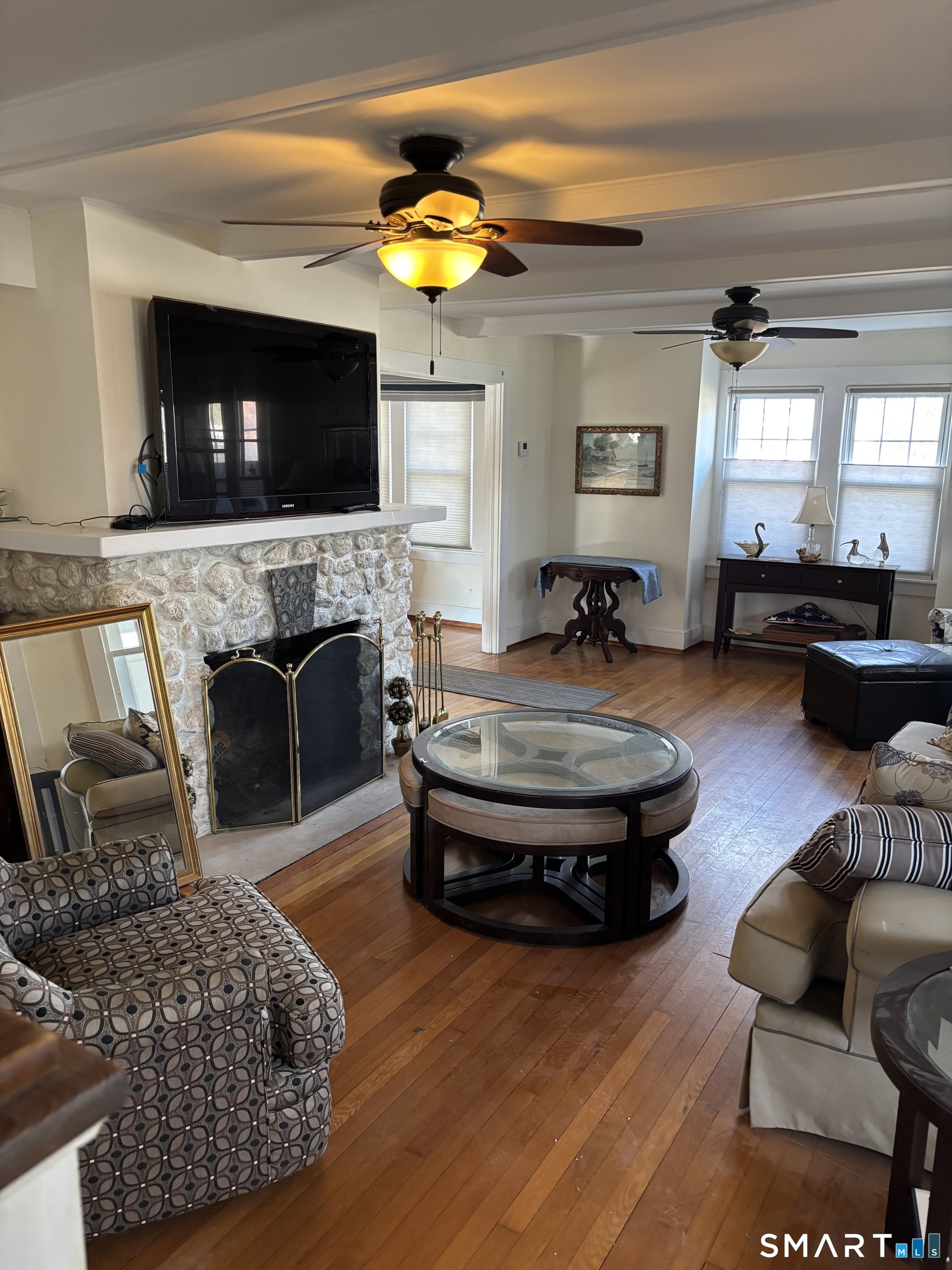 41 Sunrise Avenue Niantic, CT 06357 - Photo 9 of 15 a living room with furniture and a flat screen tv