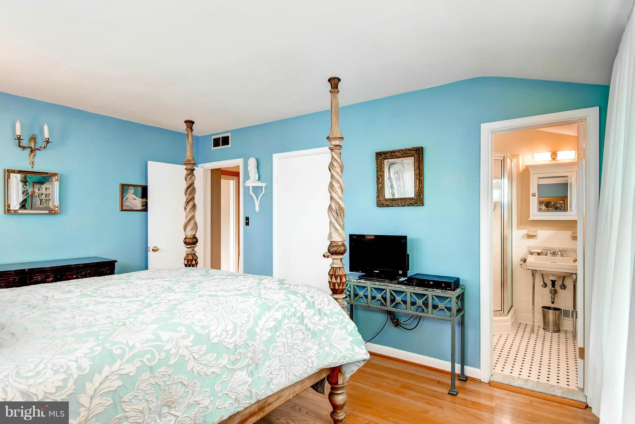 1202 Windy Gate Road Towson, MD 21286 - Photo 20 of 29 a bedroom with a bed and a flat screen tv