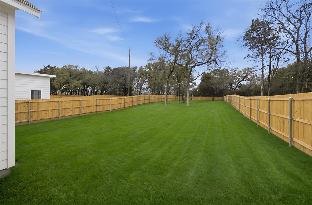1119 Riverwood Road Dallas, TX 75217 - Photo 30 of 32 View of fenced backyard