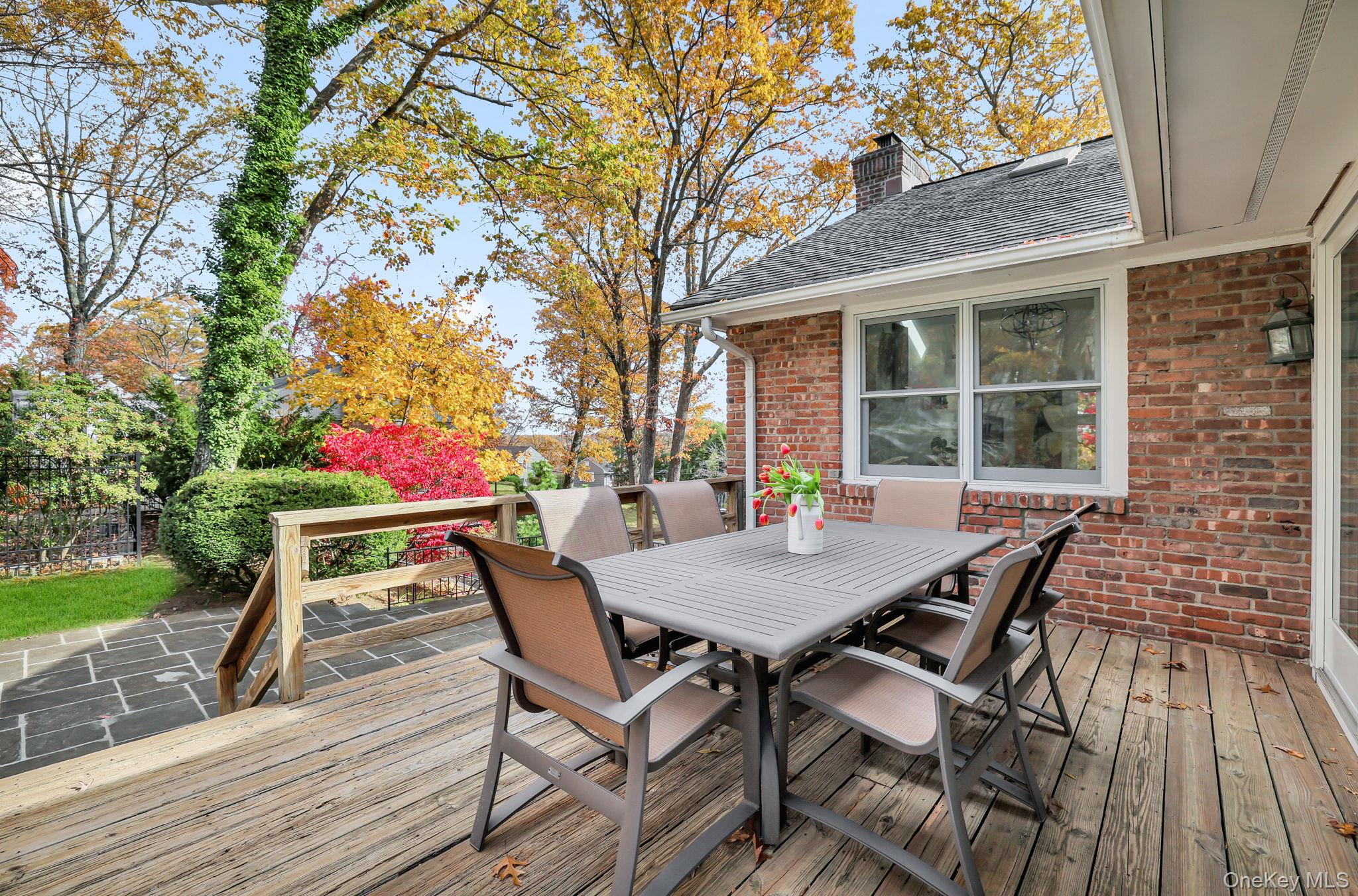 331 Old Colony Road Hartsdale, NY 10530 - Photo 11 of 16 Wooden deck with outdoor dining space