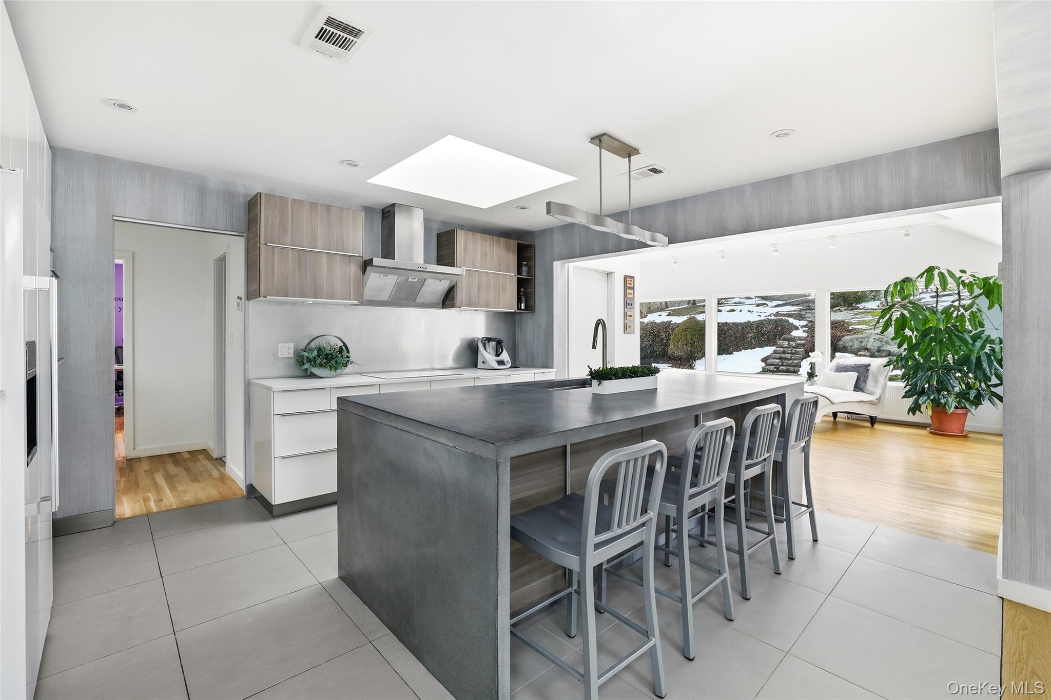 331 Old Colony Road Hartsdale, NY 10530 - Photo 12 of 45 a kitchen with a table and chairs in it