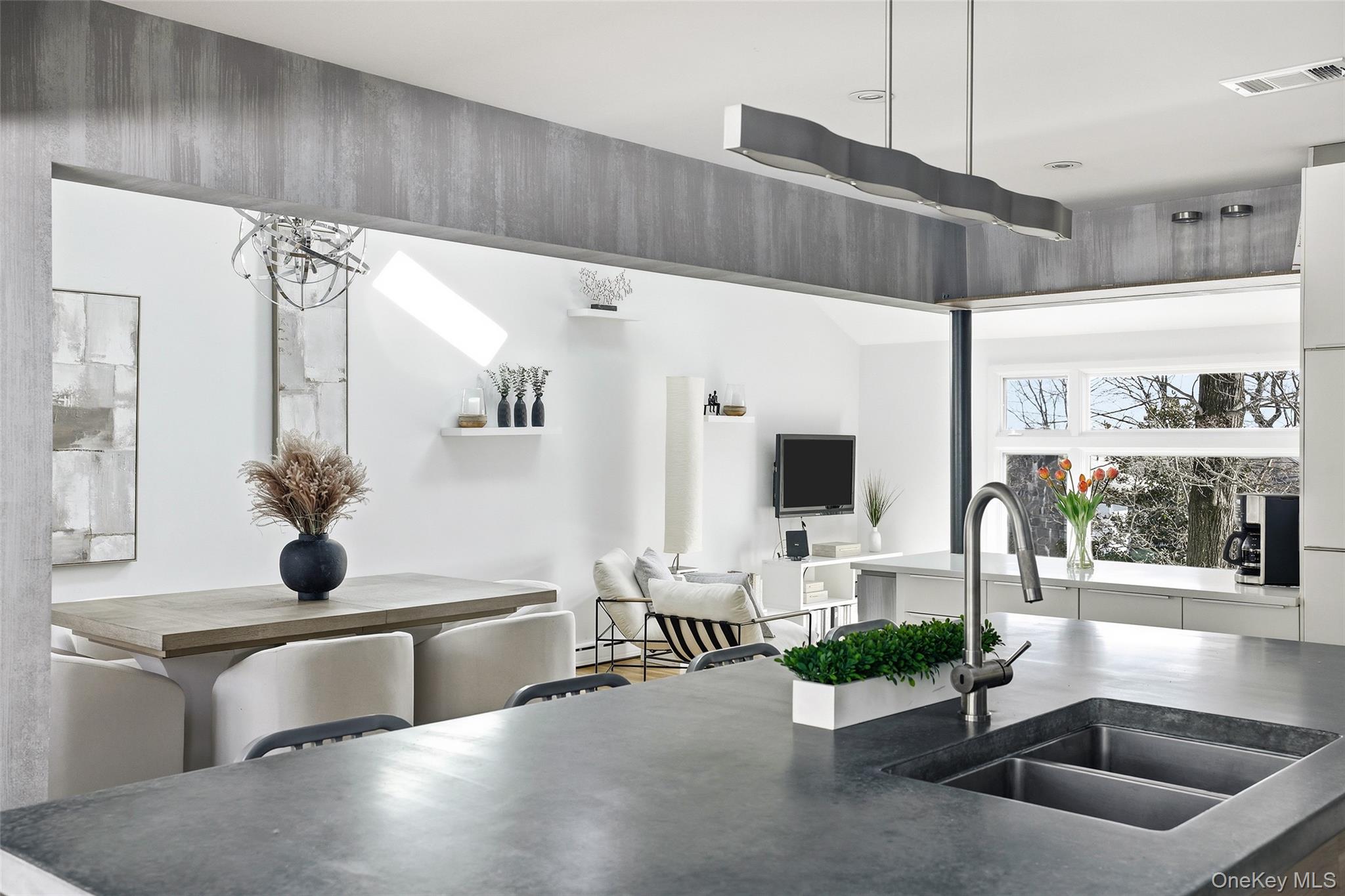 331 Old Colony Road Hartsdale, NY 10530 - Photo 15 of 45 a kitchen with a sink and a large window