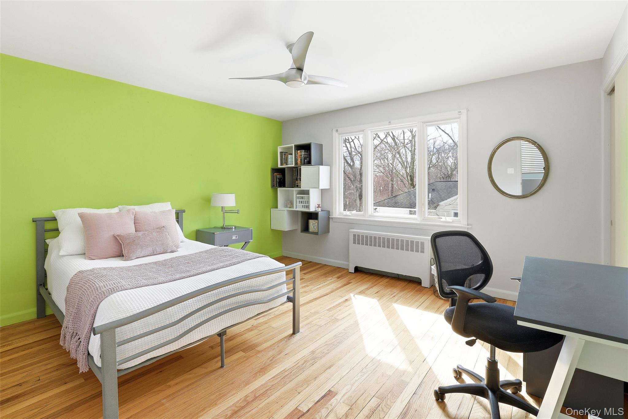 331 Old Colony Road Hartsdale, NY 10530 - Photo 22 of 45 a bedroom with a bed a desk and chair