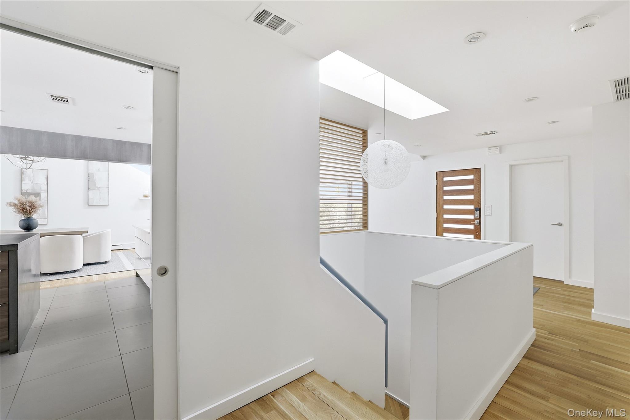 331 Old Colony Road Hartsdale, NY 10530 - Photo 25 of 45 a view of hallway with furniture and wooden floor