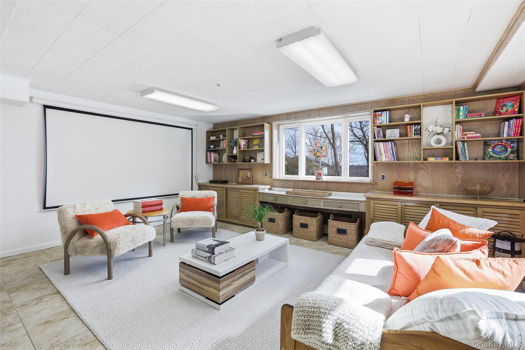 331 Old Colony Road Hartsdale, NY 10530 - Photo 30 of 45 a living room with furniture and a book shelf
