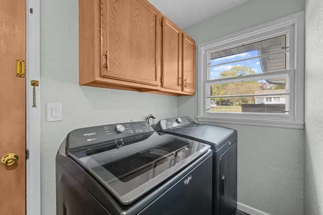 a kitchen that has a sink and a stove
