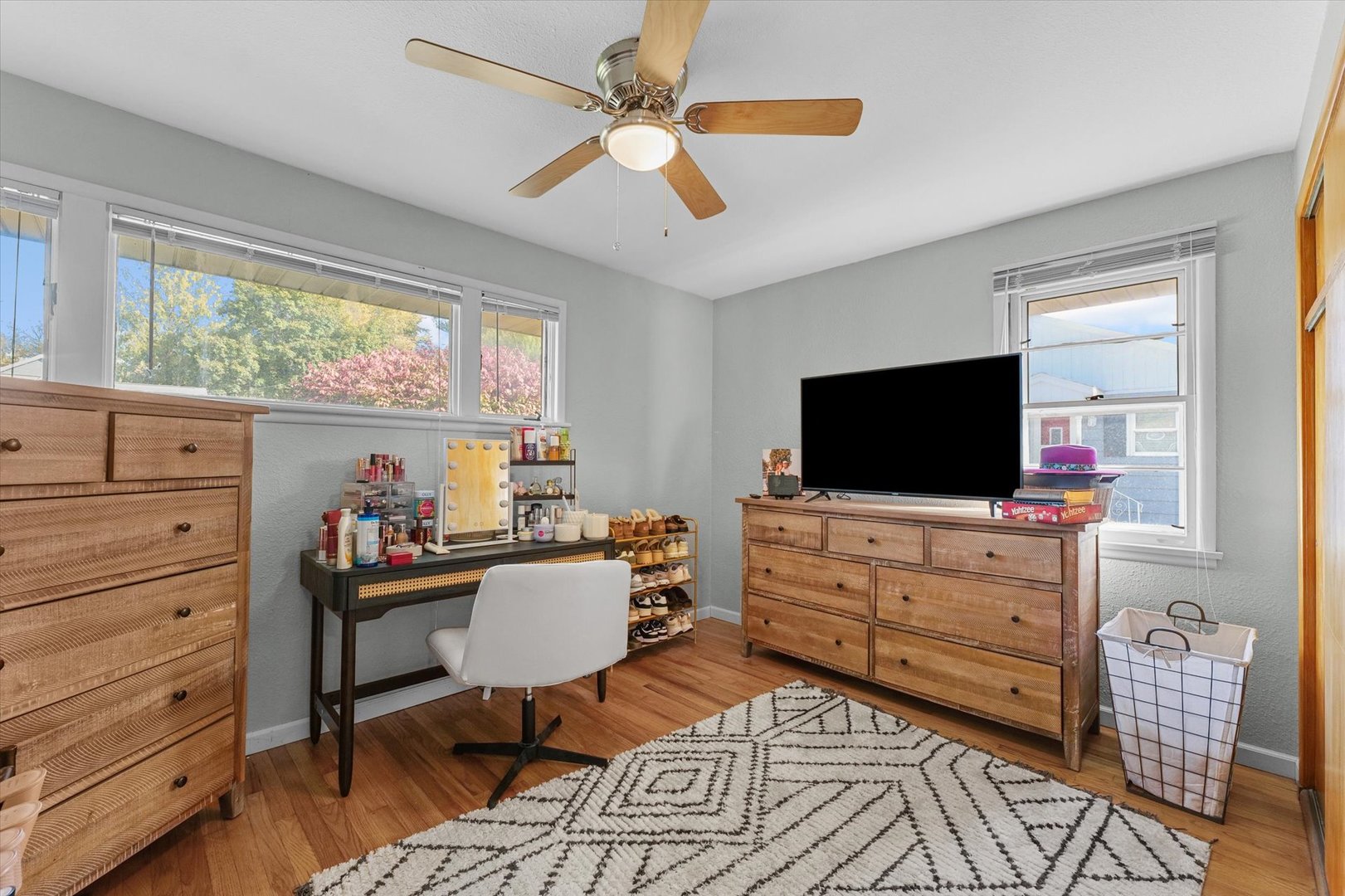 1609 West John Street Champaign, IL 61821 - Photo 22 of 30 a view of a livingroom with workspace and a window