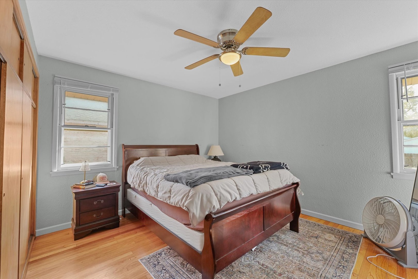 1609 West John Street Champaign, IL 61821 - Photo 25 of 30 a bedroom with a bed and window