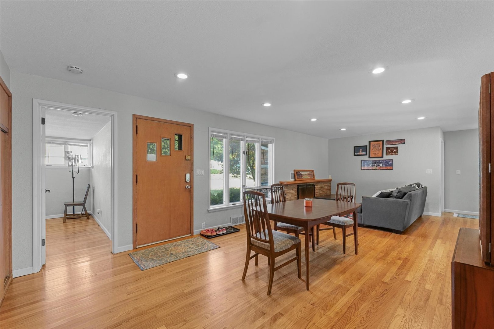 1609 West John Street Champaign, IL 61821 - Photo 6 of 30 a dining room with furniture and wooden floor