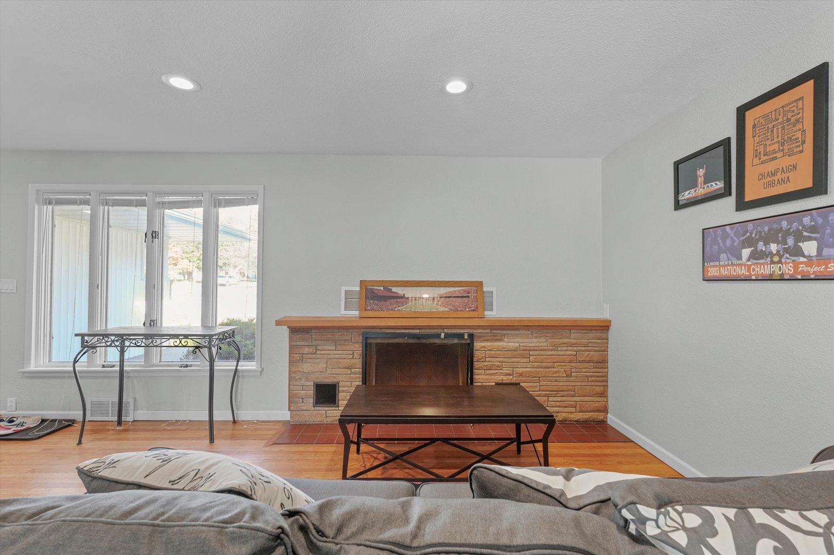 1609 West John Street Champaign, IL 61821 - Photo 8 of 30 a bedroom with a bed and a table